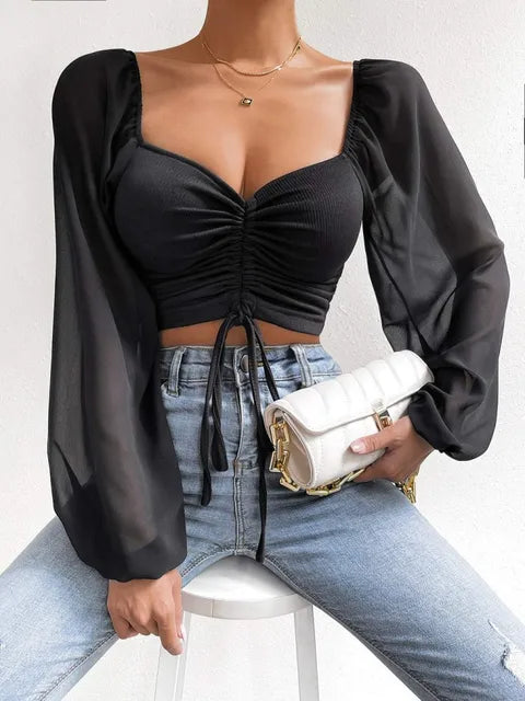 https://ae01.alicdn.com/kf/S531aad1c58c14ea8a8ec0b59d761f67bZ/ALLUKASA-Sexy-Mesh-Lantern-Sleeves-Drawstring-Wrap-Chest-Bare-Midriff-T-Shirt-Women-Long-Sleeves-Bottoming.jpg_640x640.jpg